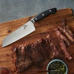 Executive-Plus Serie 7" Santokumesser 61 HRC Damaszenerstahl -Einrichtungsgeschäft 10039011 de 0005 logo