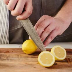 Executive-Plus Serie 6" Allzweckmesser 61 HRC Damaszenerstahl -Einrichtungsgeschäft 10039018 de 0005 logo